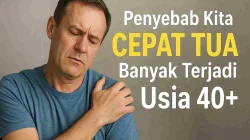 Pria usia 40-an terlihat pegal di bahu sebagai ilustrasi penyebab tubuh cepat tua akibat gaya hidup kurang aktif.