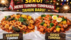 Menu tumpah-tumpahan tahun baru berupa seafood tumpah dan sosis tumpah pedas manis yang disajikan di atas meja untuk makan bersama